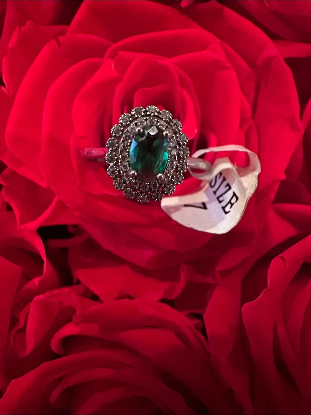 Emerald Green Halo Ring with Clear Accent Stones